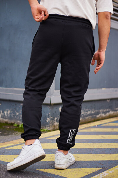 Trendyol Collection Μαύρο παντελόνι με λεπτομέρεια εκτύπωσης κειμένου - Κανονική κοπή TMNAW25EA00003