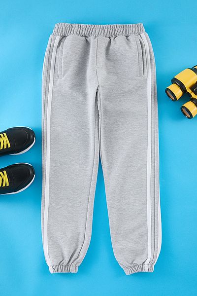 TRENDYOLKIDS Grey Boy Knitted Mini Me tepláky Tkdaw25Ea00017