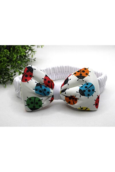 Tezcan Aksesuar Bandă de păr model cu fundă cu model buburuză