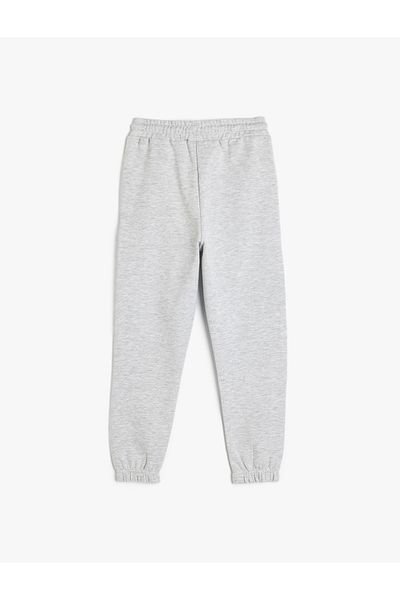 Koton Pantaloni de sport cu șireturi în talie cu imprimeu cu slogan