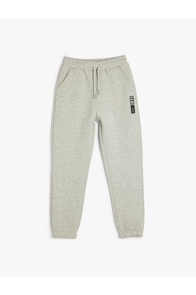 Koton Printed Jogger Sweatpants with Pocket Detail and Tie Waist