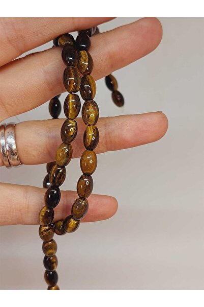 Yasamtohumu Камінь «око тигра» з різьбленням у вигляді ячменю, 6*9 мм (54692)