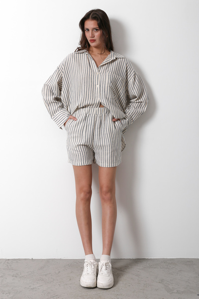 Trendyol Collection Béžové pruhované mušelínové šortky s elastickým pasem Bermudy TWOSS25SR00039