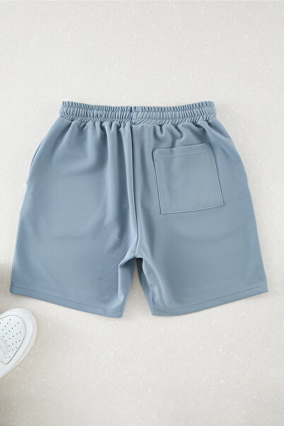 Trendyol Collection Бермуди з текстурованим синім принтом Regular Fit TMNSS25SR00022