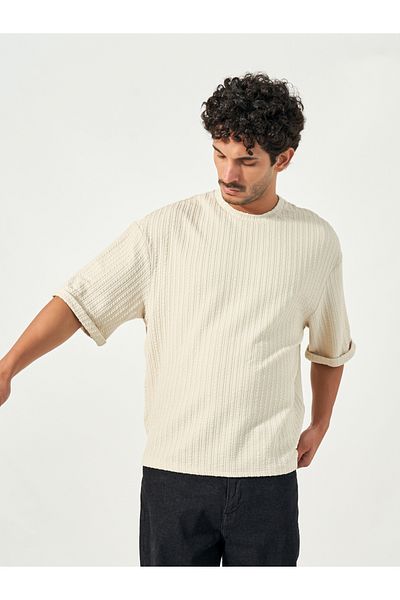 Styli Seersucker Textured Knit Boxy Fitted T-Shirt with Turn-Up Sleeves