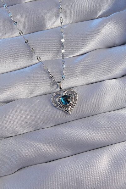 Skygo 316L سلسلة فولاذية فضية اللون حجر الزركون على شكل قلب قلادة كوكب - TJ-B...