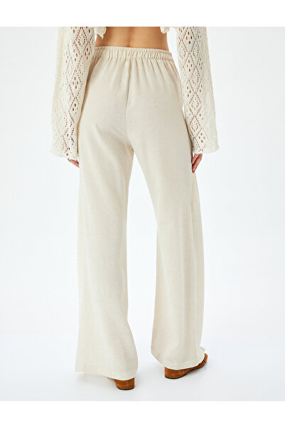 Koton Yüksek Bel Kruvaze Detaylı Yanları Yırtmaçlı Keten Karışımlı Pantolon