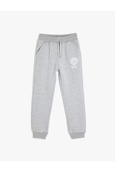Koton Βαμβακερό ριγέ Jogger φούτερ με λεπτομέρεια τσέπης και ελαστική μέση