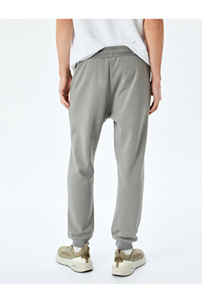 Koton Χειμερινό παντελόνι με κορδόνια στη μέση, κανονική εφαρμογή, επένδυση fleece βαμβακερό μείγμα