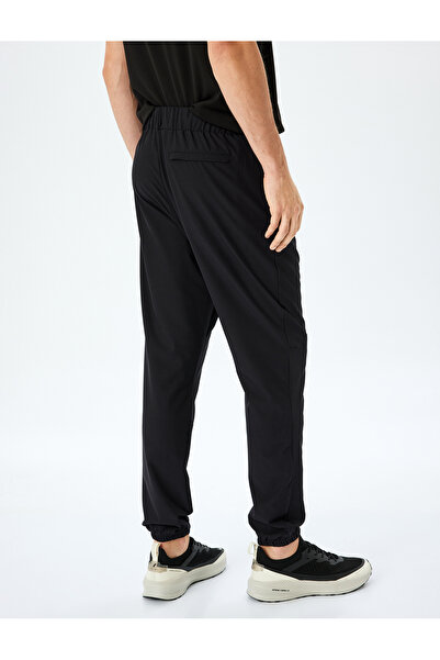 Koton Jogger Sports Sweatpants with Zippered Pockets and Lace-Up Waist