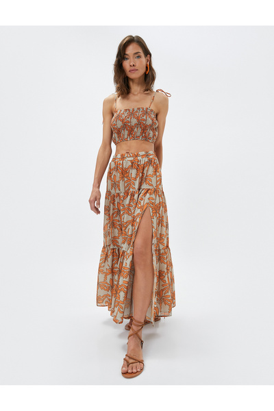 Koton ميلس أغازت كوتون - تنورة متوسطة بطبعة زهور مع شق