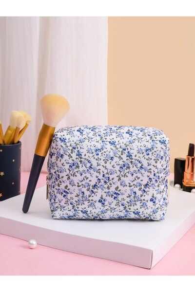 Choice حقيبة مستحضرات تجميل منفوخة مبطنة مزينة بالزهور باللون الأزرق، حقيبة م...