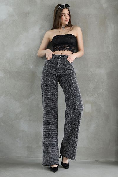 Trendyol Collection Czarne teksturowane jeansy z wysokim stanem i szerokimi nogawkami Twoss25Je00149