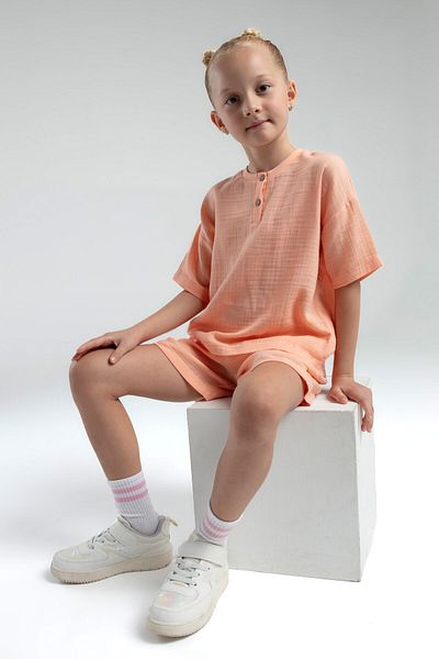 Rolypoly Girls' orange shorts set