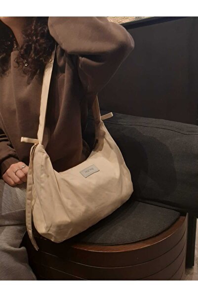 RONASBAG Bow Bag Krem Kadın Astarlı Içi Gözlü Fiyonk Detaylı Fermuarlı Baget Kol Çantası
