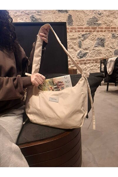 RONASBAG Bow Bag Krem Kadın Astarlı Içi Gözlü Fiyonk Detaylı Fermuarlı Baget Kol Çantası