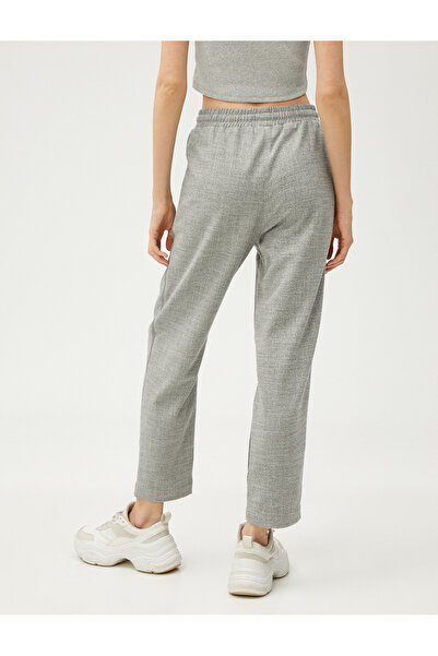 Koton Kalhoty Relax s kapsami a vázaným pasem