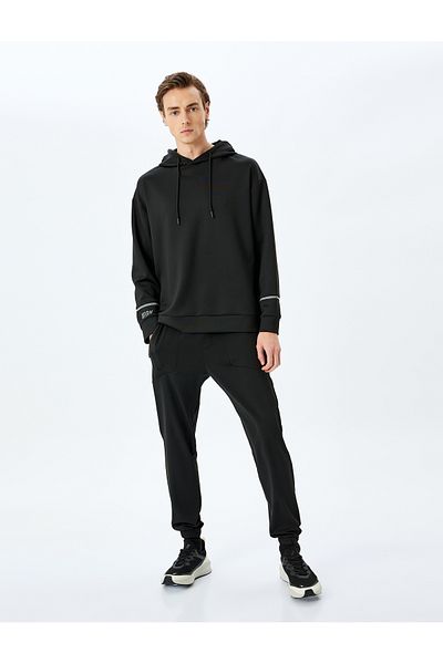 Koton Αθλητικό παντελόνι Jogger με κορδόνια στη μέση και ελαστικά πόδια