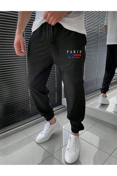 BUY CENTER Ψηλόμεσο παντελόνι Jogger Paris - Μαύρο εμπριμέ ελαστικό χειμερινό αθλητικό κοστούμι