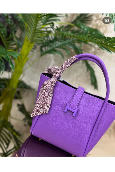 Krista Bell YUMUŞAK EL ÇANTASI