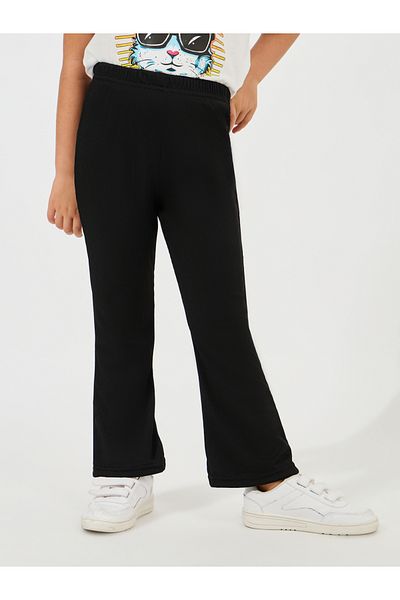 Styli Solid Ribbed Flare Hem Pants
