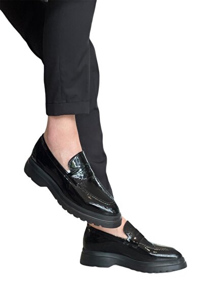 Serhat Özköroğlu Piele lacuită neagră, negru clasic