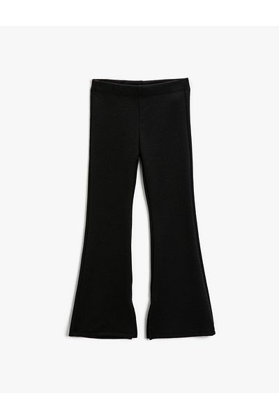 Koton Enganliegende Leggings mit spanischem Bein und elastischem Bund – Schlitzdetail