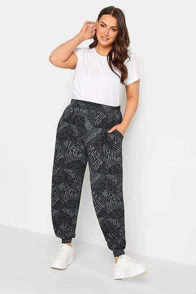 Stil Diva Pantaloni de sport din lycra cu model de mărime mare, cu buzunare elastice pe picioare și talie elastică 143411