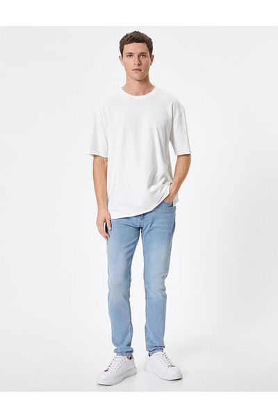 Koton Spodnie jeansowe męskie w kolorze niebieskim - 4Sam40115Nd