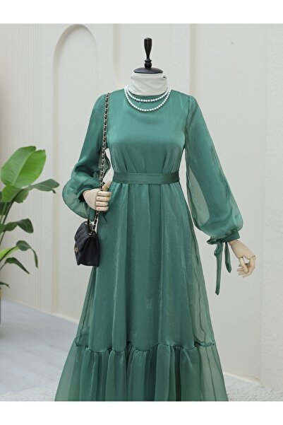 Modamorfo Πράσινο φόρεμα Janjan - Μανίκι με κορδόνι και σπαστό στρίφωμα