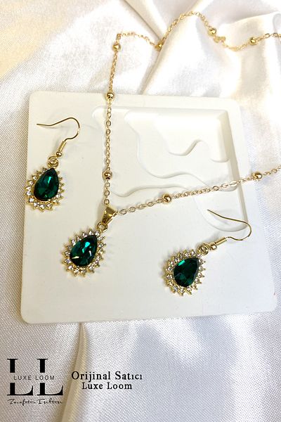 Luxe Loom Zarafetin Işıltısı طقم أقراط على شكل قطرة الماء من حجر الزركون الذهبي للنساء 001
