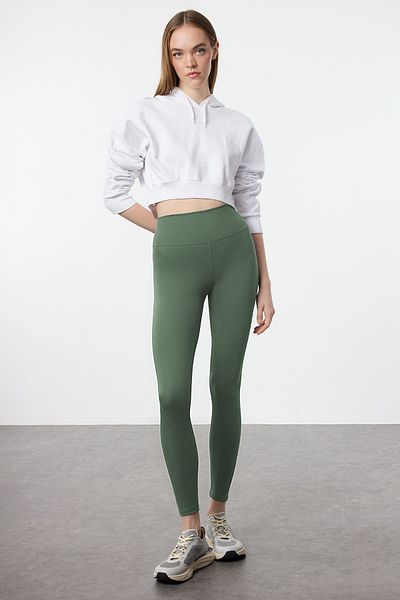Trendyol Collection Khakifarbene, weiche, gebürstete Stoff-Strick-Sportstrumpfhose in voller Länge mit reflektierendem Druckdetail THMAW25TY00020