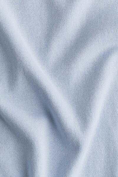 H&M بلوزة بولو محبوكة بشكل جيد