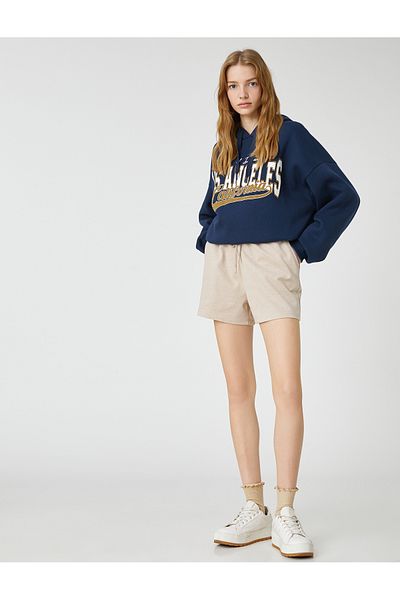 Koton Mini-Shorts mit Spitzenbund, lockerem Schnitt und detaillierten Taschen