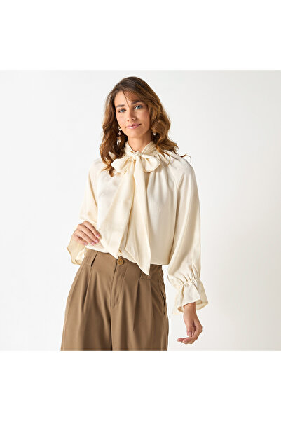 Iconic Textured Top With Tie-neck And Flounce Sleeves