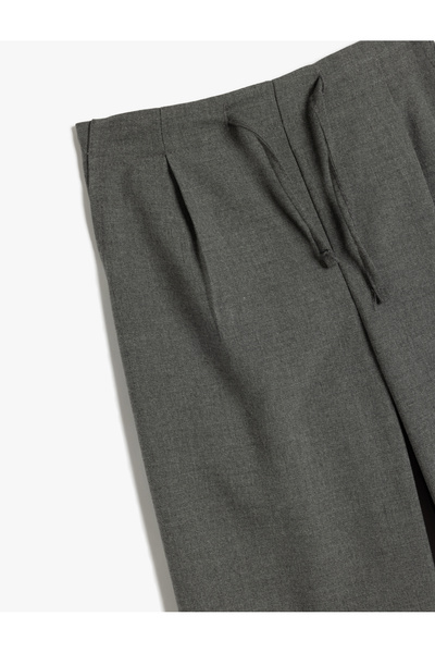 Koton Bol Paça Pantolon Cep Detaylı Beli Bağlamalı