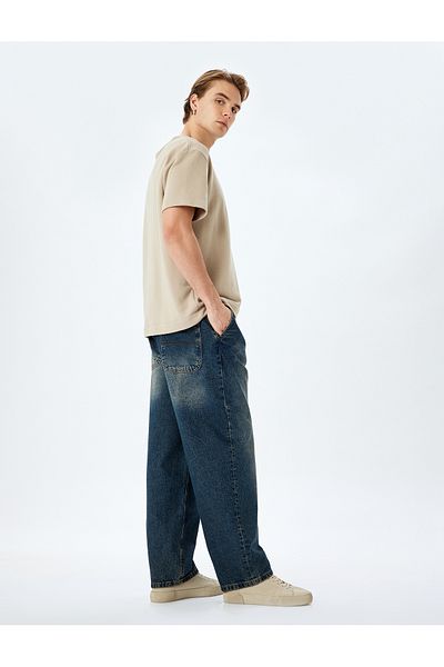 Koton Chino-Jeanshose aus Baumwolle mit normaler Taille und Taschendetail, lockere Passform