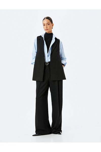 Koton Crepe fabric side tied lapel collar long vest.