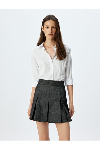 Koton High rise mini pleated skirt.