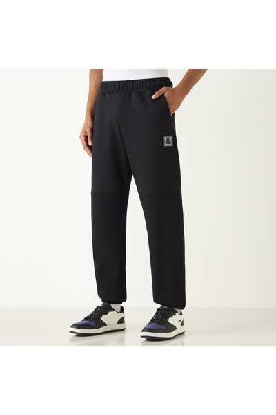 Kappa بنطال رياضي بتفاصيل الشعار مع حزام خصر مطاطي وجيوب