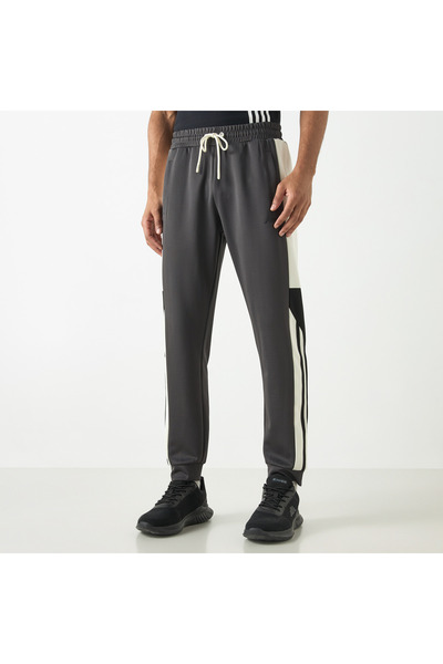 Kappa بنطال رياضي مقسم إلى أجزاء مع جيوب وإغلاق برباط