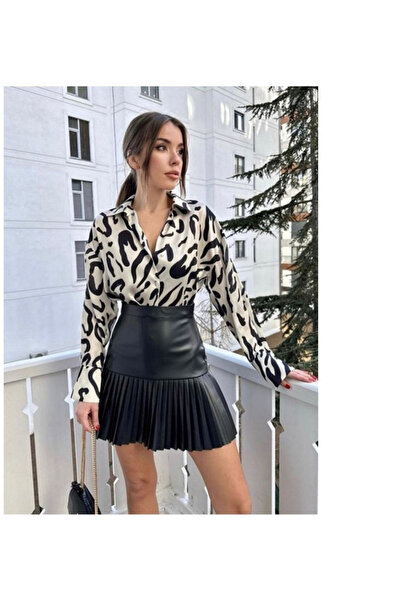 Fibula تنورة قصيرة من الجلد بنصف طيات