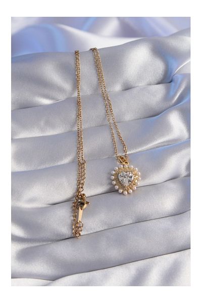 Store 316l سلسلة الصلب لون الذهب اللؤلؤ الزركون حجر القلب تصميم قلادة