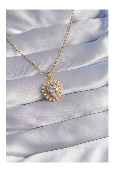 Store 316l سلسلة الصلب لون الذهب اللؤلؤ الزركون حجر القلب تصميم قلادة