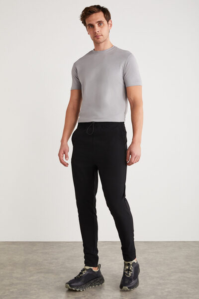 GRIMELANGE Ανδρικό πώμα κανονικής εφαρμογής Λεπτομερές τεχνικό ύφασμα ελαστικό μαύρο παντελόνι μέσης