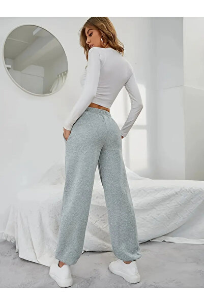 CAONNES Ελαστική γκρι φόρμα JOGGER - Ελαστικά τελειώματα στα πόδια, που απομα...