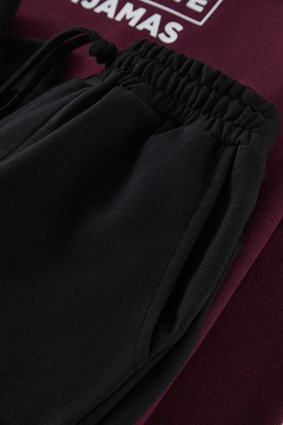 Trendyol Collection Tmavě vínová sada pleteného pyžama Regular Fit Tmnaw22Pt0759