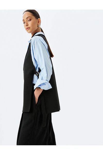 Koton Crepe fabric side tied lapel collar long vest.