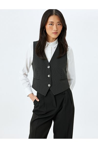 Koton Buttoned V-neck striped blazer vest.