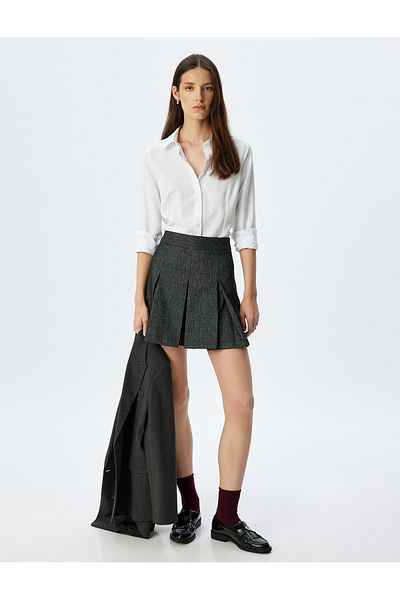 Koton High rise mini pleated skirt.
